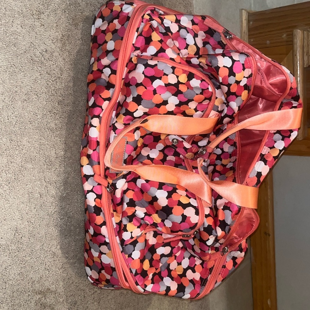 Like new Vera Bradley bag with wheels not sure what the design is called